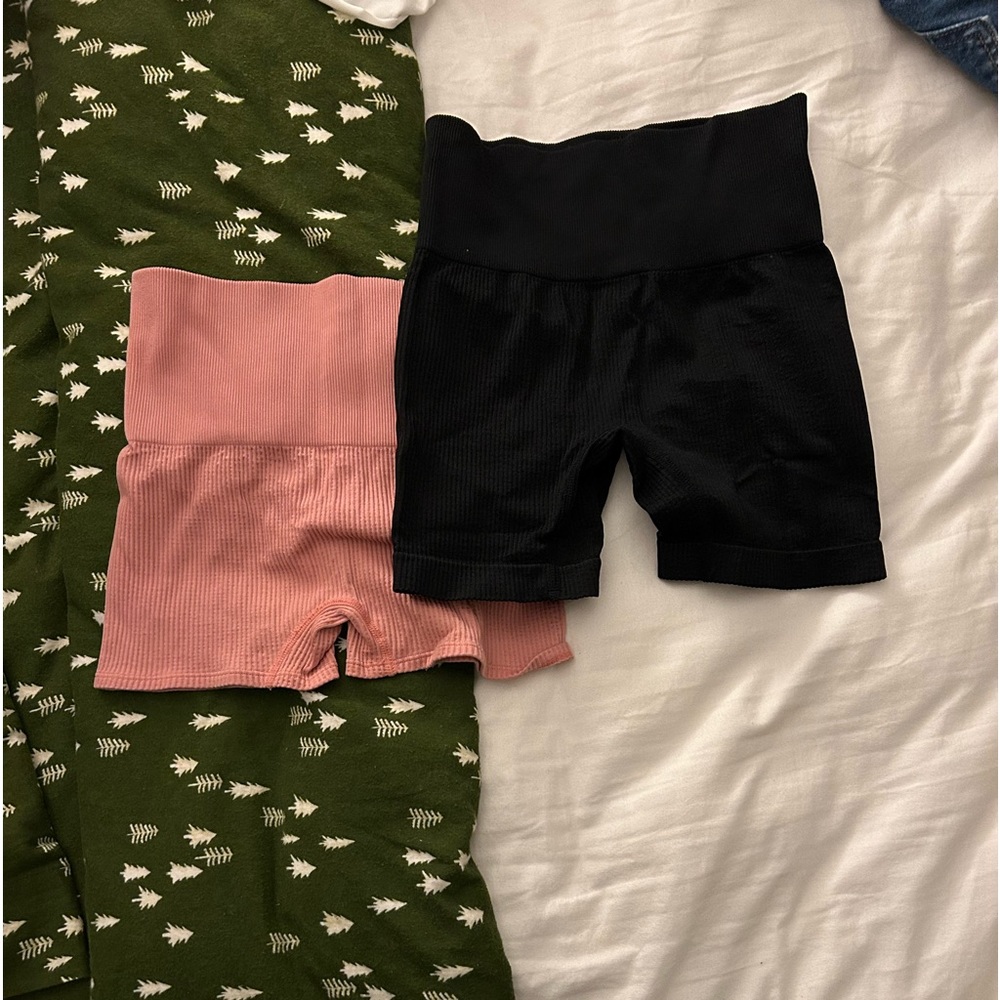 two colsie shorts. pink is xs and black is s